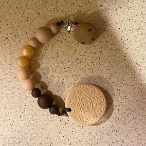 Lil chew baby biscuit and pacifier clip